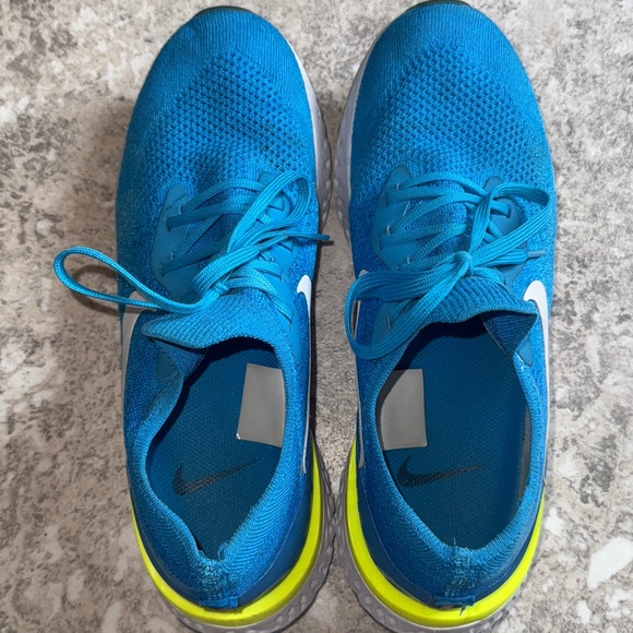 Nike Men’s 10 Epic React Flyknit
Colorway: Blue Glow/White-Photo Blue-Volt Glow - Picture 3 of 11